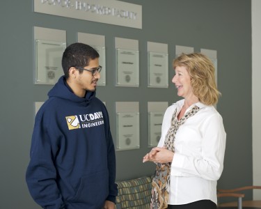 Jennifer Sinclair Curtis, dean of the UC Davis College of Engineering, talks with materials science major Lino Romero.