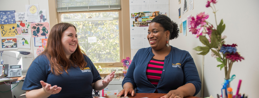Ashley Jess, a Forensics Graduate Student chats with career advisor Marjannie Akintunde, in her office in South Hall