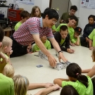 Harry Cheng with a group of young students at the C-STEM Center